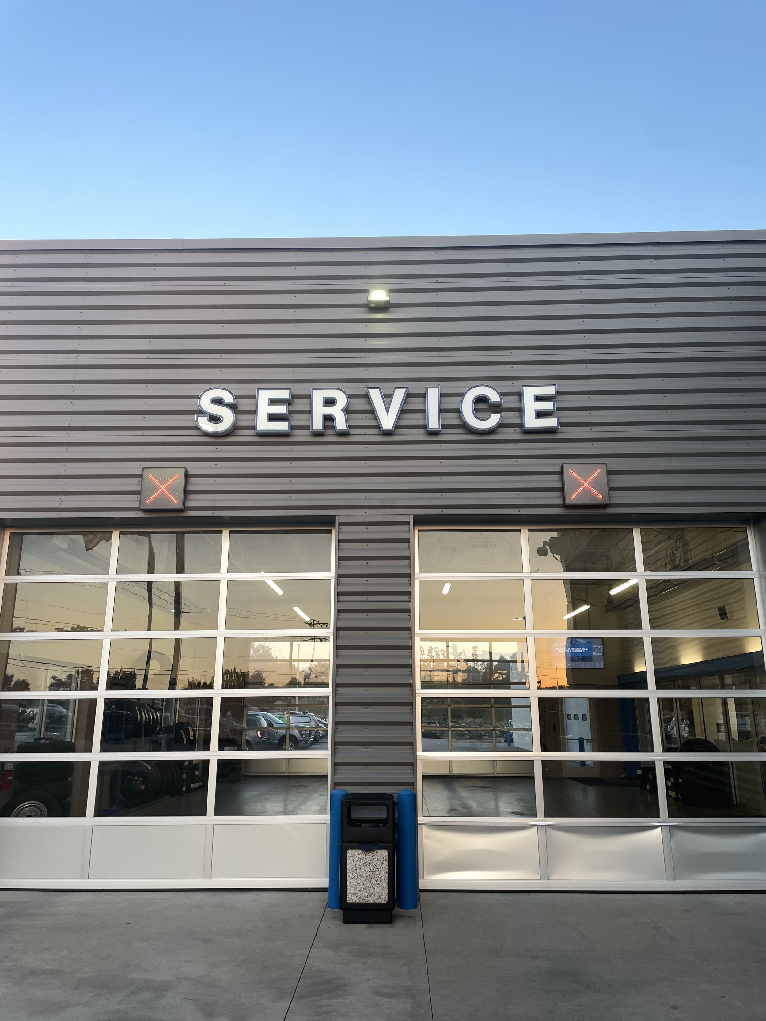 Automotive dealership service drive and customer lounge maintained daily